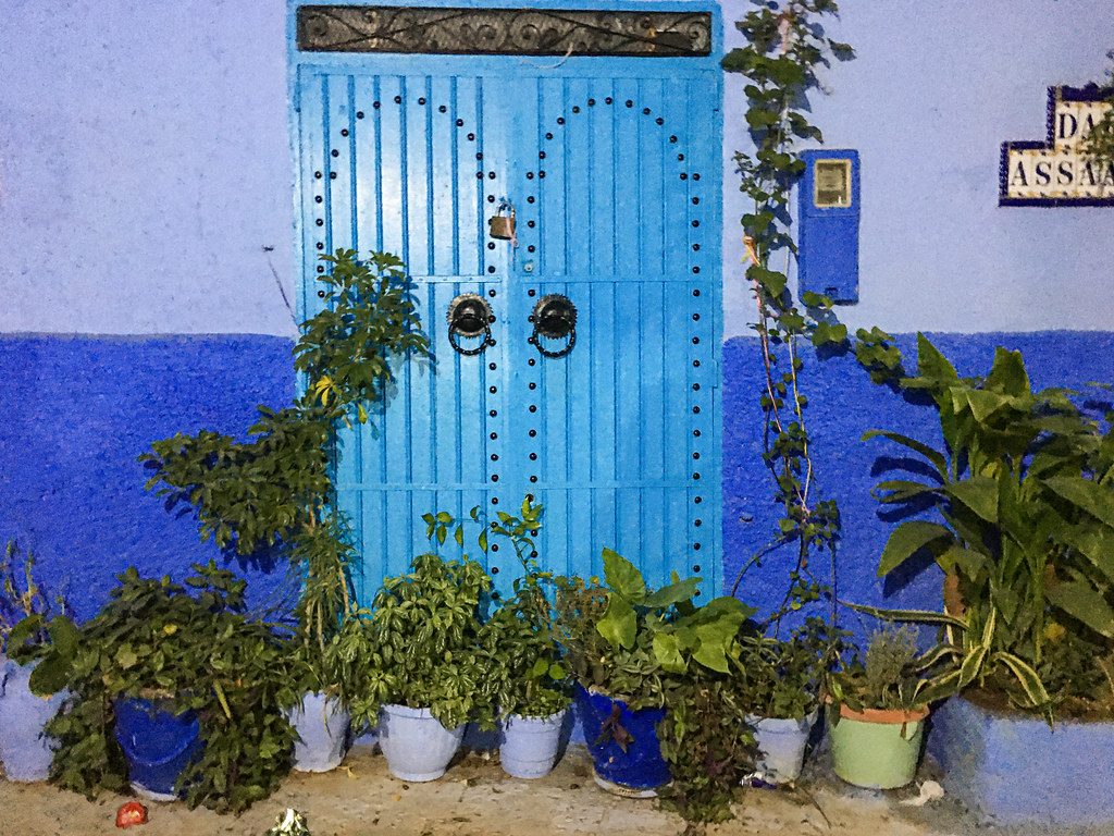 Blue-painted steps and walls in the old town of Chefchaouen, Morocco.